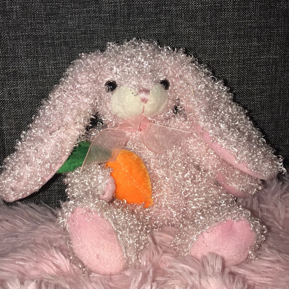 a fuzzy pink bunny stuffed animal